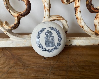 Antique Edwardian coat of arms ironstone bottle lid