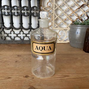 Antique Aqua apothecary clear glass bottle