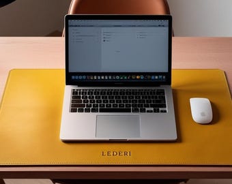 May include: A modern workspace featuring a laptop, mouse, and glasses on a wooden desk. A yellow leather desk mat with the word "LEDERI" is centered. A black desk lamp and a small potted plant are also visible.