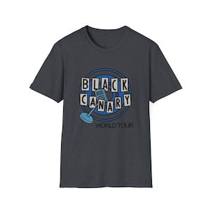 May include: A dark heather gray t-shirt with a blue and white graphic of a microphone and the text "BLACK CANARY WORLD TOUR".