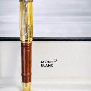 May include: A trio of ceramic mugs with a speckled, matte finish in cream, light grey, and dark grey. Each mug features a simple, minimalist design and a rounded handle.