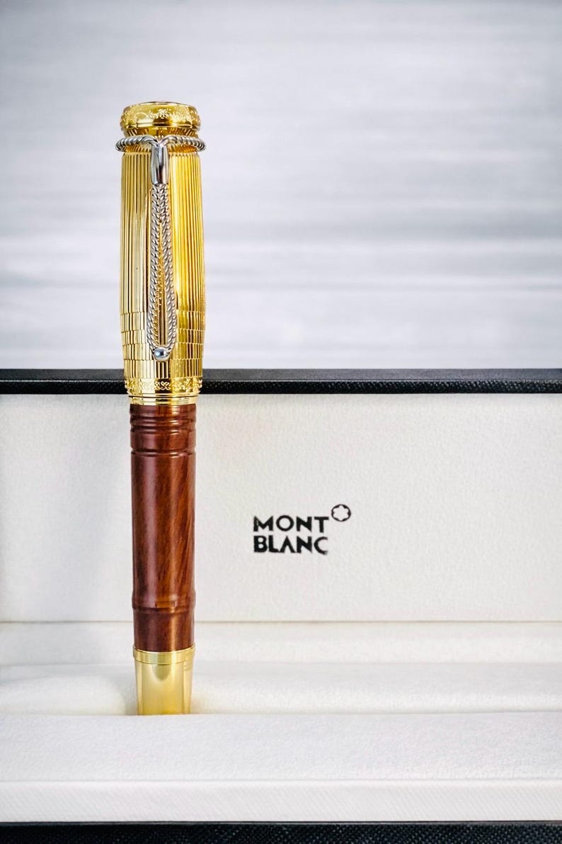 May include: A trio of ceramic mugs with a speckled, matte finish in cream, light grey, and dark grey. Each mug features a simple, minimalist design and a rounded handle.