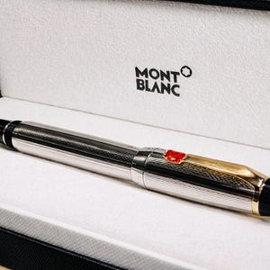 May include: A set of three ceramic mugs with a speckled, matte finish. The mugs are in shades of cream, light gray, and dark gray. Each mug has a simple, minimalist design, perfect for coffee or tea.