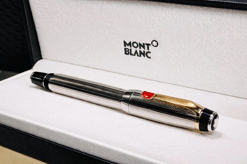 May include: A set of three ceramic mugs with a speckled, matte finish. The mugs are in shades of cream, light gray, and dark gray. Each mug has a simple, minimalist design, perfect for coffee or tea.