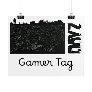 May include: A white poster with a black map graphic and the text "Gamer Tag". The poster also features the word "DayZ" in a stylized font. The map graphic is detailed and shows a landscape.