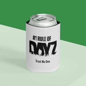 May include: White can cooler with the text "#1 RULE OF DAYZ Trust No One" in black. The cooler is wrapped around a silver can with a pull tab. The background is a gradient of green.