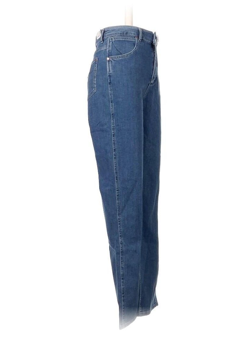 May include: Blue denim jeans with a classic five-pocket design. The jeans have a straight leg cut and a medium wash. The waistline is high-rise. The jeans are displayed on a white mannequin. The overall style is casual and versatile.