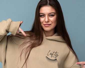 Lefty Sand colored hoodie, Lash on front and left sleeve, Unisex Heavy Blend™ Hooded Sweatshirt, Leftie hoodie, sleeve print