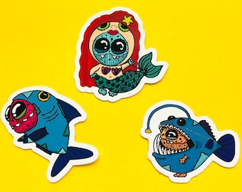 Stickers Set van drie Wobblins Monster Collectable Arial de kleine zeemeermin en zeevrienden