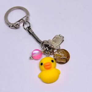 Nuevo bebé, llavero de patito de goma bendecido, dije para bolso, bendecido por Shaman (yo)
