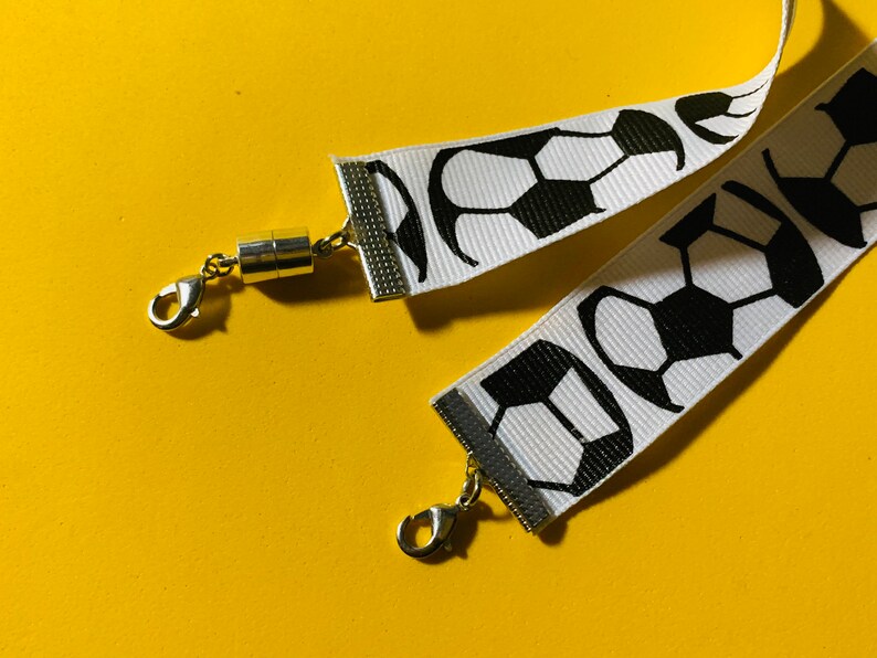 black and white safety clasp option available soccer ball 34 inches long Lanyard for face mask