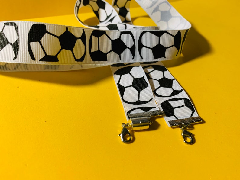 black and white safety clasp option available soccer ball 34 inches long Lanyard for face mask