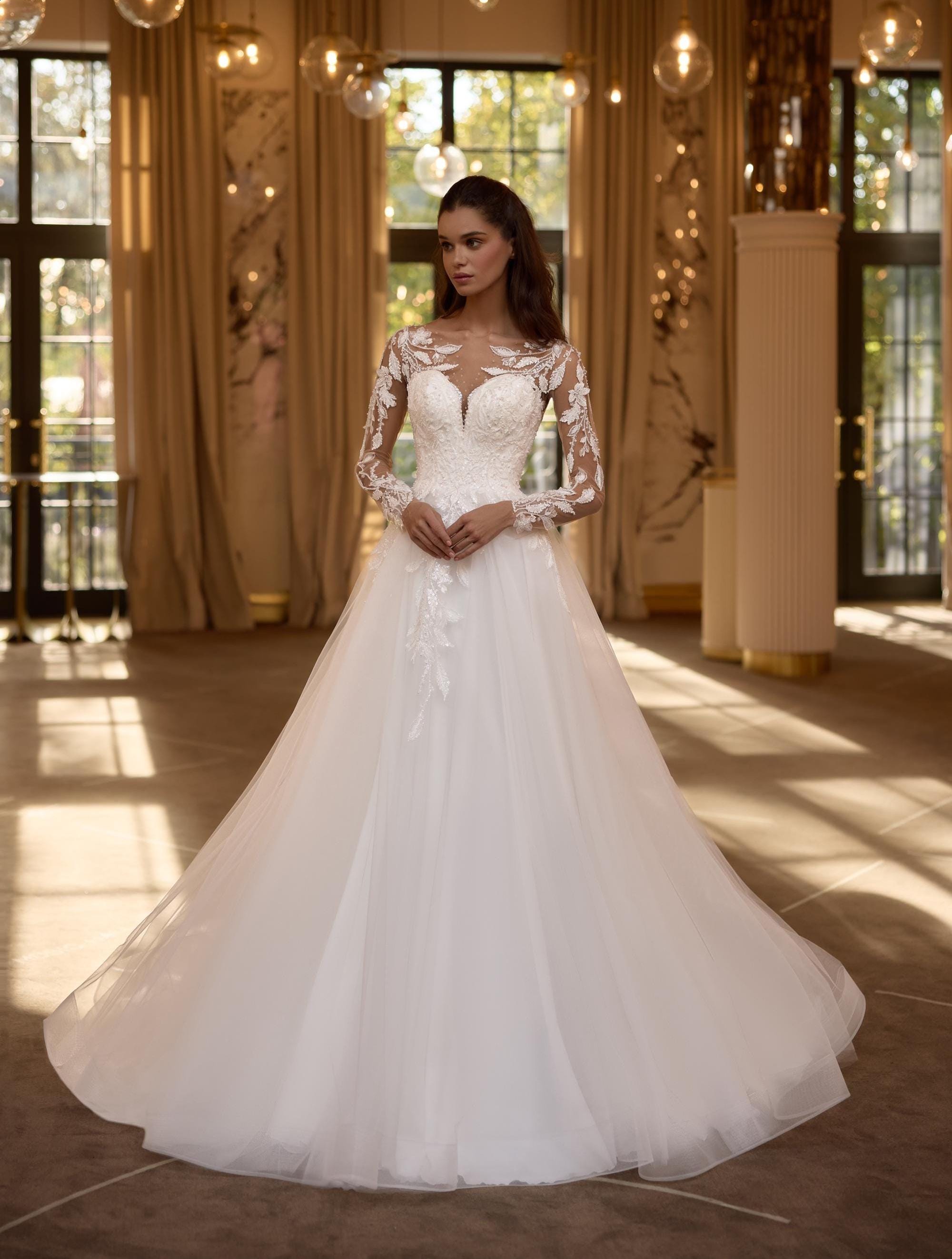 Robe de mariée trapèze en tulle et dentelle florale