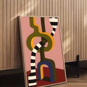 Contemporary abstract artwork featuring bold interlocking geometric shapes in olive green, gold, navy, and black-and-white stripes on a pink and red background.