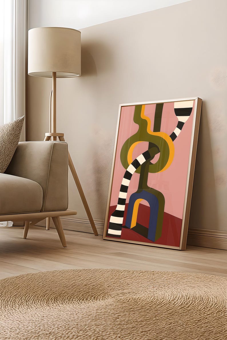 Contemporary abstract artwork featuring bold interlocking geometric shapes in olive green, gold, navy, and black-and-white stripes on a pink and red background.