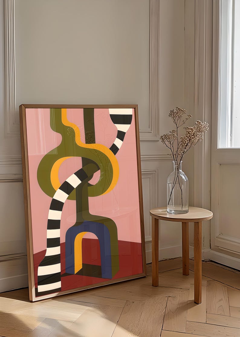 Contemporary abstract artwork featuring bold interlocking geometric shapes in olive green, gold, navy, and black-and-white stripes on a pink and red background.