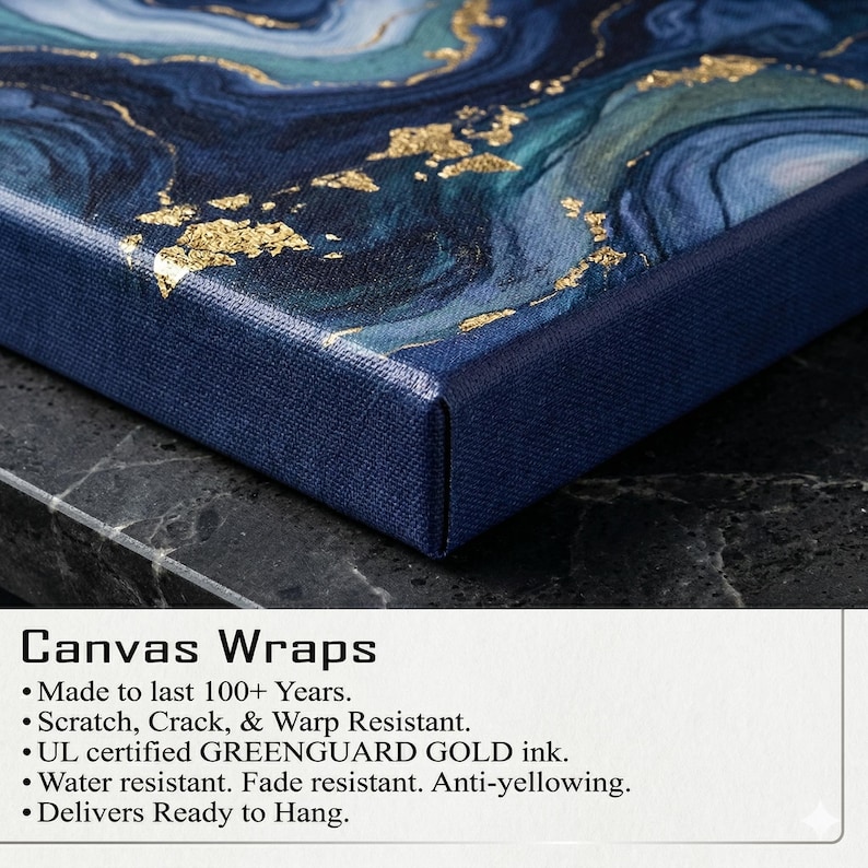 The image is a close-up of a canvas wrap with a marble-like pattern in shades of blue and gold. The text provides information about the canvas wrap, including that it is made to last 100 years, scratch-resistant, has aUL certified greenguard gold ink, is water resistant, and delivers ready to hang.