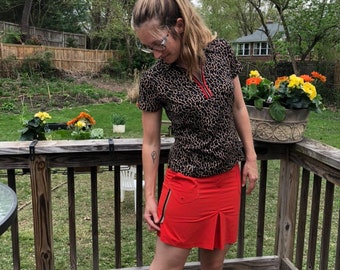 TAILS LEOPARD TENNIS SeT, Tennis  Outfit,  Size 4, Shirt and Skort, Orange and Black, Tennis, Animal Print, Leopard Print at Modern Logic