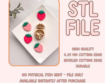 Puede incluir: Descarga de archivo STL para un cortador de galletas de fresa imprimible en 3D. La imagen muestra un plato blanco con cinco formas de fresa rosa y verde, y un cortador de galletas dorado en el centro.