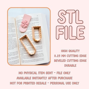 May include: A pink bookmark with a flower design and two gold-colored metal book page holders are displayed on an open book. The image also includes text that says "STL FILE" and details about the product.