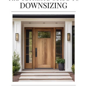 May include: A white house with a wooden front door and two sidelights. The door has a single pane of glass in the top half and a solid wood bottom half. There are two black sconces on either side of the door. The house has white trim and a black roof.