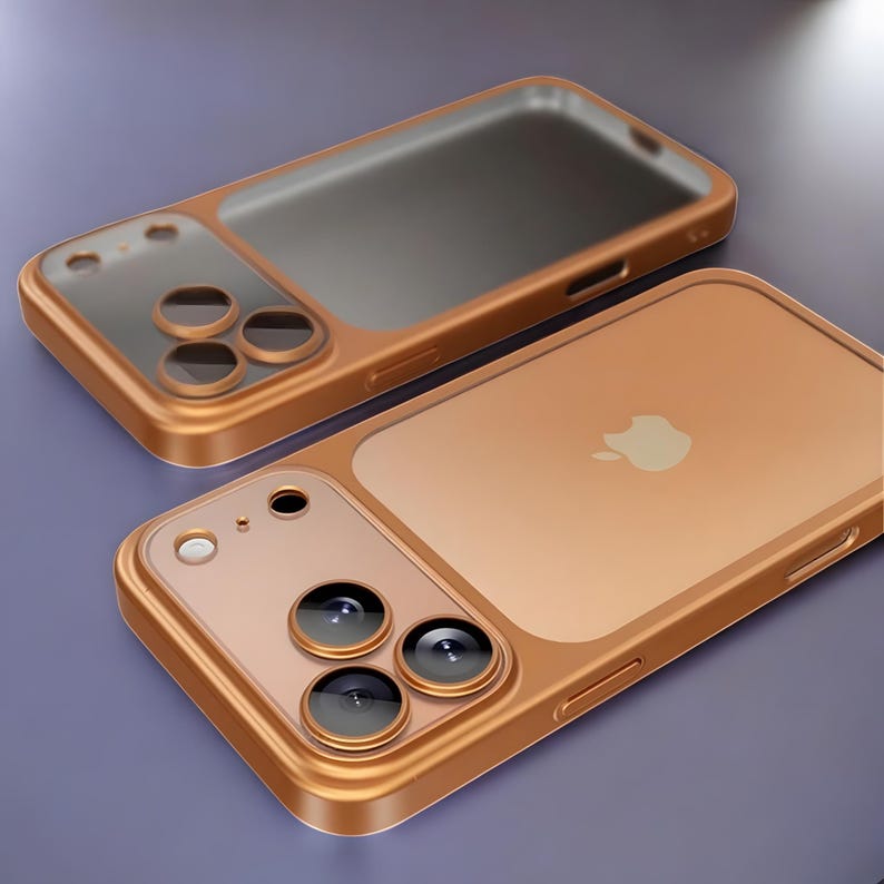 May include: Two gold-colored phone cases. One case is open, revealing a clear back and camera cutouts. The other case is closed, displaying the Apple logo. The cases have a metallic finish and a clear section for the camera lenses.