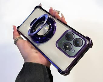 May include: Clear phone case with a purple frame and a purple ring holder. The ring holder has the text "KATHY TECH" and "Quality makes the future". The case has a camera module with three lenses.