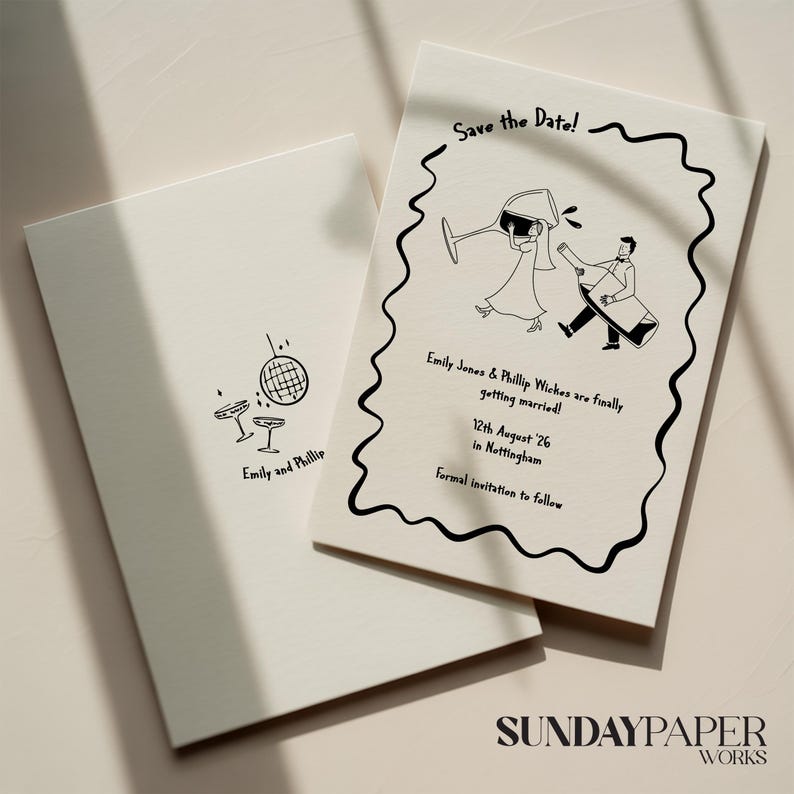 May include: Two off-white wedding invitation cards. One card has a disco ball and two champagne glasses. The other card has a black border and a cartoon of a couple with the text "Save the Date!" and wedding details.