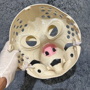 Wolf-inspired Dire Mask head base for fursuit and cosplay creators, featuring a functional hinge jaw for realistic movement and a stylized canine design that blends cartoon and fantasy elements. 3D printed in lightweight, durable PLA, this base is ideal for anthro and kemono builds. Easy to paint, fur, or accessorize, perfect for Halloween costumes, conventions, or DIY character projects.