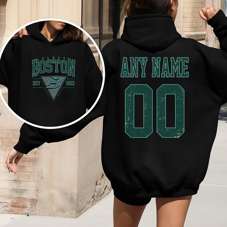 May include: Black hoodie with teal lettering and graphics. The front features "BOSTON" above a triangle with a stylized "B" and the text "EST 2023". The back displays "ANY NAME" above the number "00" in teal.