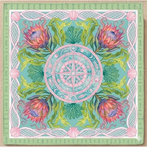 May include: Square decorative art piece with a nautical theme. The design features a central compass rose in pink and teal, surrounded by stylized flowers, seaweed, and seashells. The border is a light green with lighthouse and shell motifs.