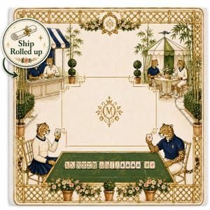 May include: An illustrated square textile featuring a green mahjong table with tiles, surrounded by a bamboo-style border. Leopard-like figures are playing mahjong in a garden setting. The text "Ship Rolled up" is in a circle.