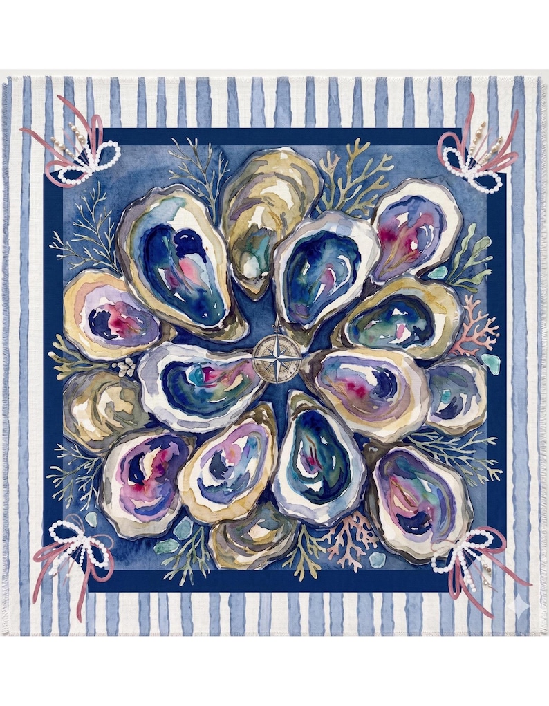 May include: A square textile featuring a watercolor illustration of oyster shells arranged in a circular pattern around a central compass rose. The design includes coral accents, pink ribbons with white beads, and a blue and white striped border.