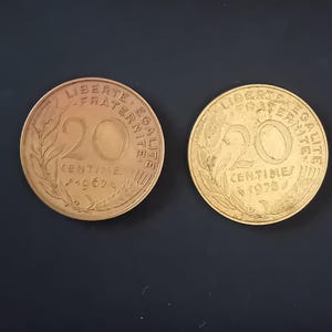 2 coins of 20 French centimes