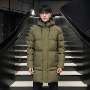 May include: An olive green puffer coat with a hood and a zip-up front. The coat is long, reaching below the knees, and has front pockets. The coat is designed for cold weather and is made of a quilted material.
