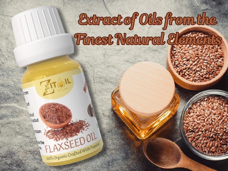 Puede incluir: Una botella de vidrio de aceite de linaza con una tapa blanca. La botella est&aacute; etiquetada con "ITIL Aceite de linaza 100% org&aacute;nico Elaborado con pasi&oacute;n". La imagen tambi&eacute;n muestra semillas de lino en un taz&oacute;n de madera y un frasco de vidrio de aceite.