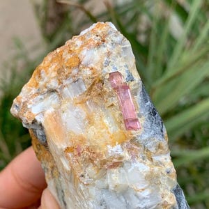 Natural Pink Color Fluorescent Topaz Crystal on Matrix Specimen from Katlang Mine Mardan Raw Topaz Specimen. 145 grams