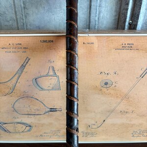 Puede incluir: Un primer plano de una empu&ntilde;adura de palo de golf de cuero marr&oacute;n con un dise&ntilde;o trenzado marr&oacute;n y negro. La empu&ntilde;adura est&aacute; envuelta alrededor de un eje de madera. La imagen est&aacute; enmarcada e incluye un dibujo de patente para una cabeza de palo de golf.