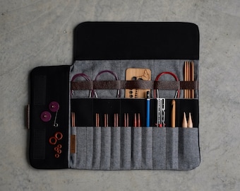Estuche de tejido para juego de agujas intercambiables en lona negra, funda protectora para herramientas.