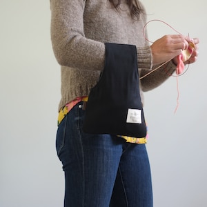 Small black knitting bag, Knitting wristlet in black, simple project bag