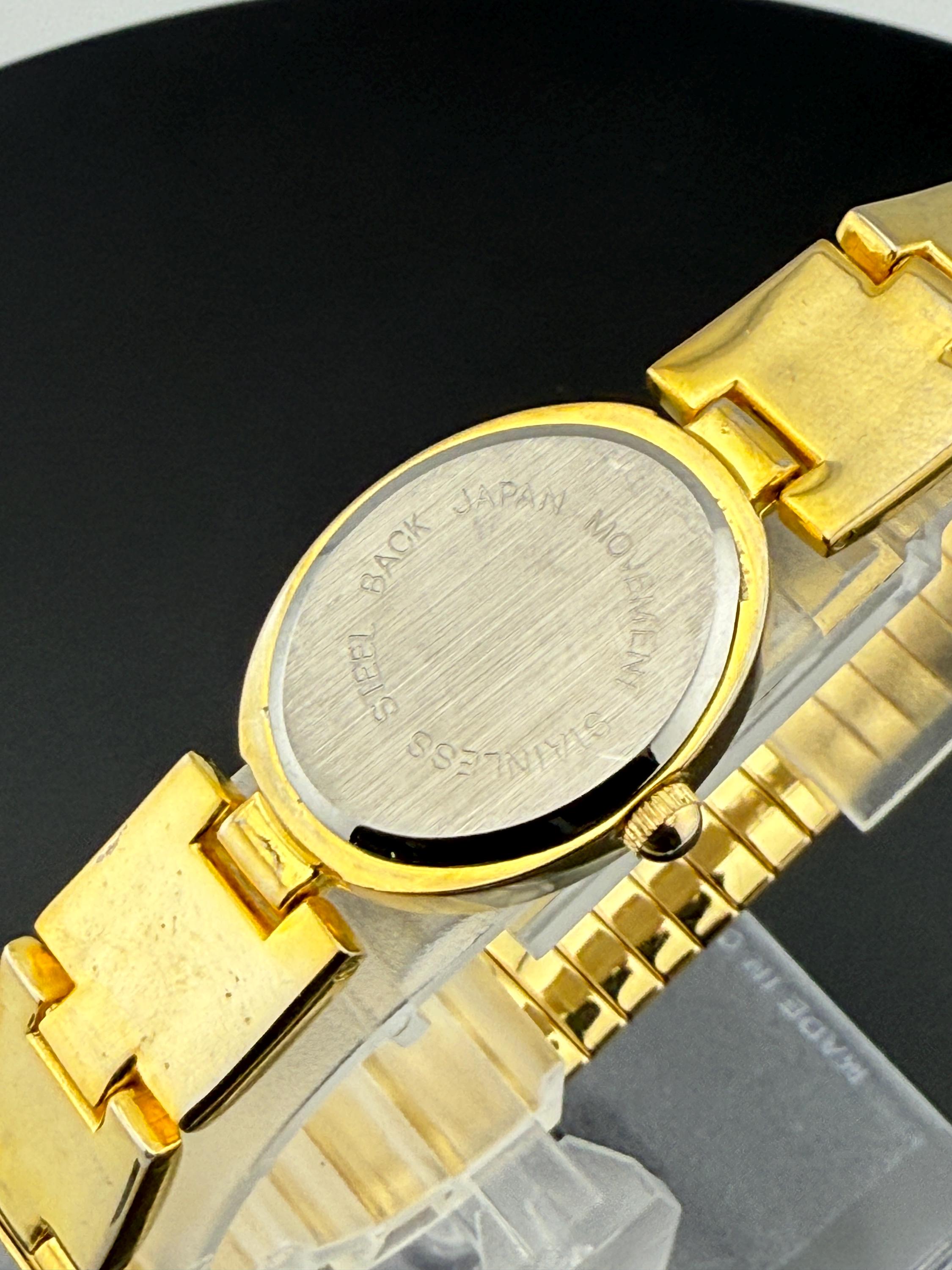 Sergio Valente Women\'s Watch Gold Tone Oval Black Dial Crystal Japan Mov\'t Dress Vintage Sergio Valente Gold Silver Women main image 4