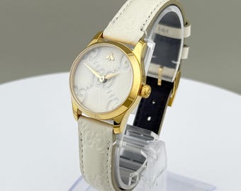 Gucci G-Timeless Bee Women’s Watch Gold 27mm Swiss Quartz Ecru GG Strap Box