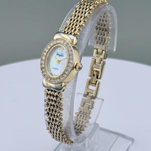Vanity Fair Watch Silver and Gold Toned Expansion Band Stretchy Elegant Vanity Fair Watch - Etsy main image 3