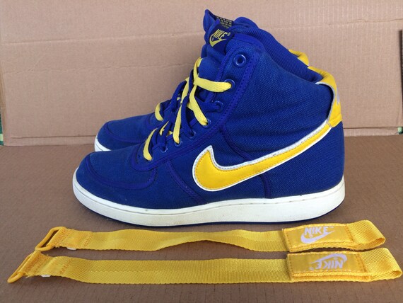 blue and yellow nike high tops