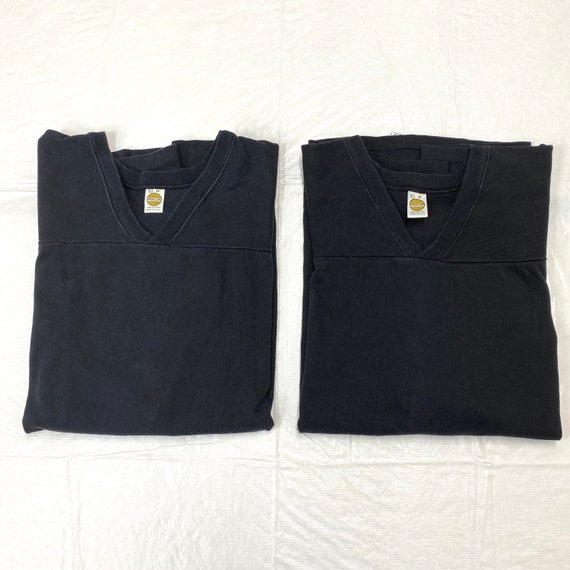Pick one 1970s black cotton football jersey tshirt … Gem