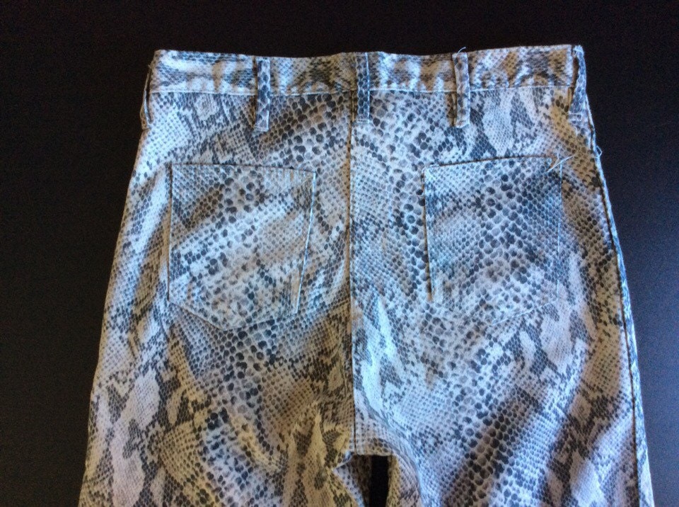 snakeskin bell bottom jeans