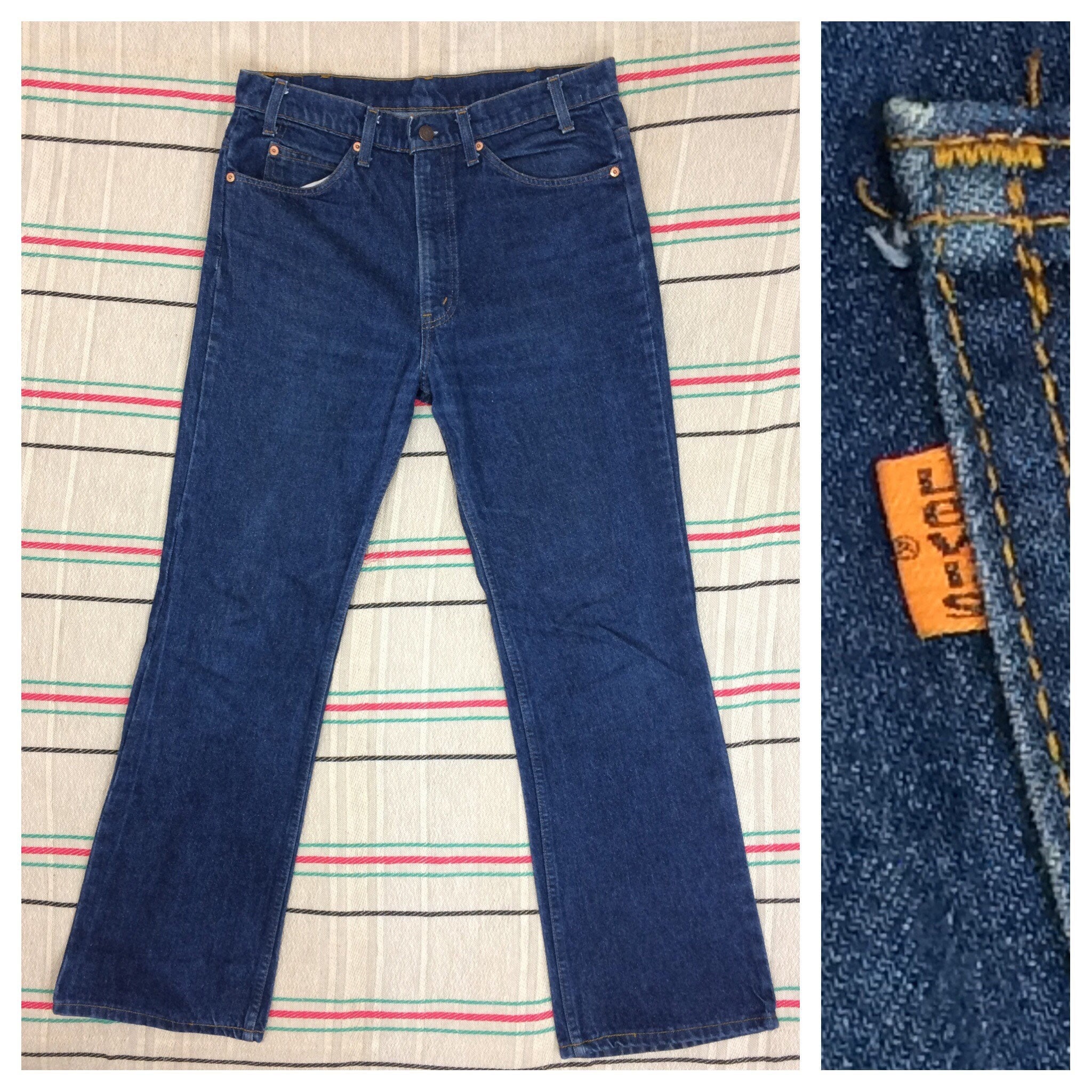 1980s Levis orange tab 517 boot cut jeans measures 33X30 dark wash denim flare blue jeans made