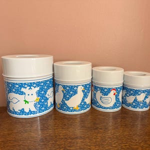 Vintage Metal Farm Animal Canister Set