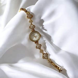 Women's vintage wristwatch, gold floral bracelet watch, delicate watch with crystal details, retro-style jewelry, elegant gift, watch gift