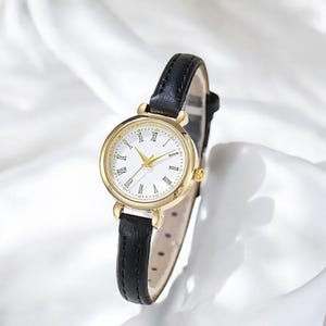 Orologio da polso vintage da donna, cassa rotonda in oro, numeri romani, cinturino in pelle, elegante segnatempo in stile retrò, perfetto regalo classico